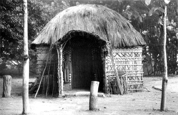 Ritual House of Chief Kindamba, 1988, showing doorway guardian figures