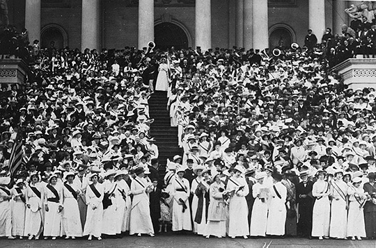 Congressional Union for Woman Suffrage procession of May 9, 1914, on the steps of the U.S. Capitol, singing “The March of the Women.”