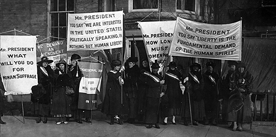 Members of the National Woman’s Party picketing in front of Cameron House Headquarters on Lafayette Square