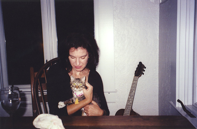 Claudia holding the cat named Lucinda Williams.